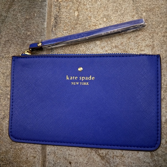 kate spade Handbags - NEW KATE SPADE BLUE LEATHER WRISTLET (Retail: $88)